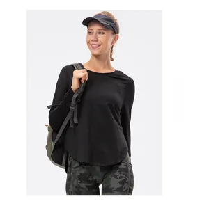 Maglia sportiva nera donna a maniche lunghe con orlo curvo, tessuto tecnico traspirante