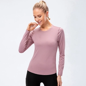 Haut de yoga à manches longues rose pour femme avec mesh respirant et coupe slim