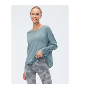 Top yoga a maniche lunghe con taglio ampio in maglia traspirante e bordo curvo