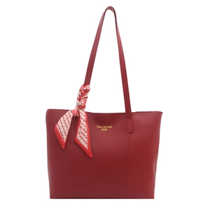 Chic red tote bag in textured synthetic leather with a decorative patterned silk scarf