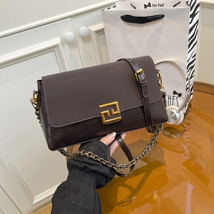 Fashionable chocolate brown chain shoulder bag with stylish gold geometric metal clasp