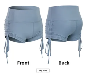 Detailed front and back views of water blue high-waisted yoga shorts with side drawstrings