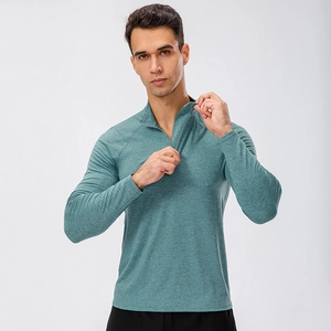 Men's quick-dry half-zip running shirt in teal heather with ergonomic raglan sleeves