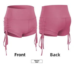 Front and back view of high waisted yoga shorts in Merlot Red with side drawstring detail