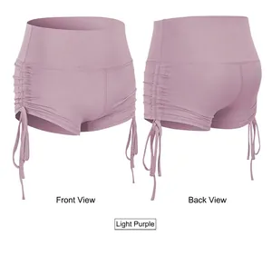Detail of high waist light purple yoga shorts with adjustable side drawstrings and ruching
