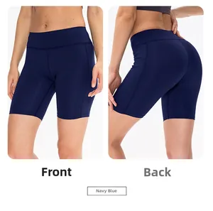 Front and back views of navy blue high-waisted yoga shorts with ergonomic flatlock seams