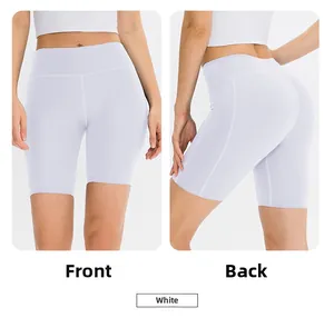 Detailed front and back views of white high-waisted yoga shorts with slimming fit