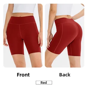 Front and back views of red high-waisted yoga shorts with wide tummy control waistband