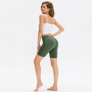 Women's olive green high-waisted yoga shorts with butt-lifting cut and side pockets