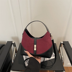Leopard print faux suede handbag in burgundy and black with gold twist lock