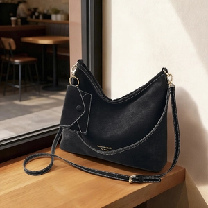 Retro black suede tote bag with adjustable strap and small triangular coin pouch