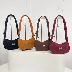 Chic suede crescent shoulder bag with 3D silver butterfly and bow strap knot detail
