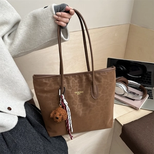 Large leopard print suede tote bag for women with cute teddy dog charm and woven strap