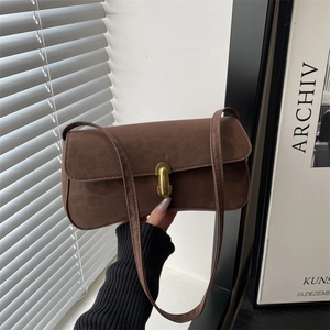 Retro dark brown faux suede shoulder bag with minimalist golden oval metal clasp