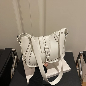 Retro white leather shoulder bag with silver rivet studs and adjustable wide strap