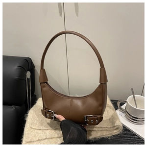 Detailed view of dark brown hobo bag with matte leather and silver double buckles