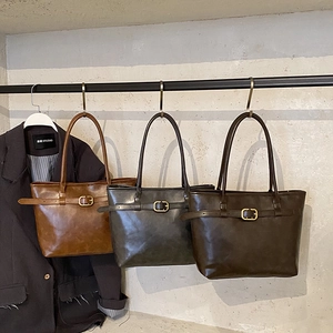 Vintage retro faux leather tote bags in caramel, brown and grey with metal buckles
