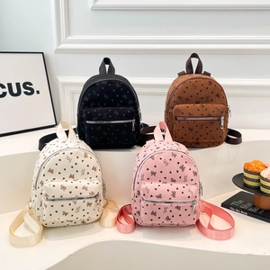 Mini zaini in velluto a coste con stampe di fiocchi e cuori in quattro colori