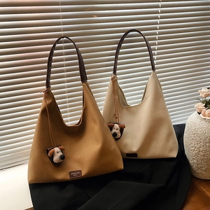 Minimalist large-capacity tote bag in caramel brown and off-white with dog charm