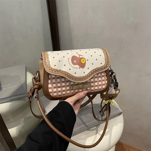 Chic plaid crossbody bag with red polka dot flap and cute bear pendant for daily commute