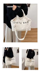 Detailed views of white corduroy tote bag with TOTE BAG embroidery and adjustable strap