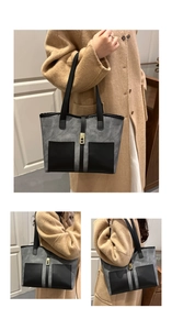 Detail of grey suede tote bag featuring black leather pockets and golden twist-lock closure