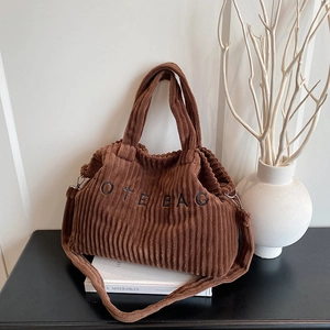 Brown corduroy tote bag with TOTE BAG embroidery and adjustable shoulder strap
