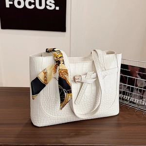 White faux crocodile leather tote bag with elegant silk scarf on handle and metal buckle