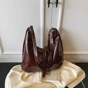 Vintage dark brown oily leather tote bag with long straps for casual commute style