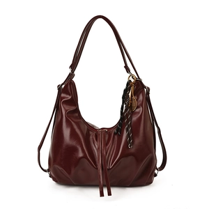 Deep red vintage large capacity faux leather tote bag with unique tennis racket pendant