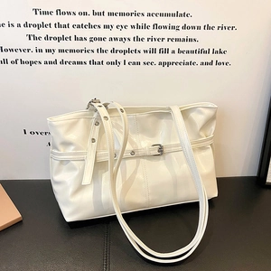 Cream white vintage leather tote bag with double shoulder straps and buckle detail