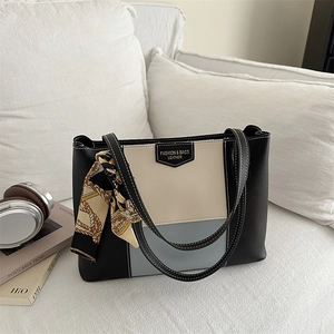 Retro color-block tote bag with silk scarf detail and spacious leather design
