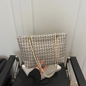 Chic tweed plaid tote bag with light gold chain strap for elegant commuter style