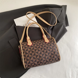 Vintage Boston satchel bag with geometric pattern and red edge detailing for women