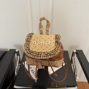 Floral embroidery patchwork backpack in brown and beige PU leather with frill detail