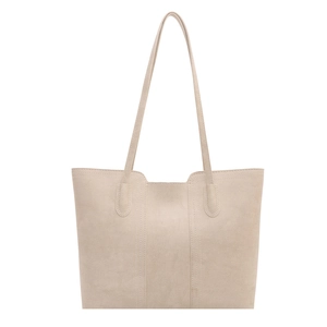 Minimalist beige tote bag with matte texture and long shoulder straps for daily use