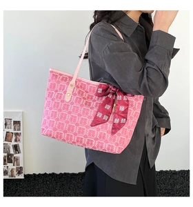 Pink canvas wedding gift tote with red double happiness bow and silk scarf detail