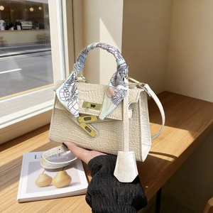 Creamy white crocodile texture handbag with silk scarf and metal turn-lock closure