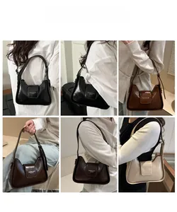 Close-up detail showing four colors of minimalist faux leather baguette shoulder bags
