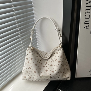 Chic corduroy tote bag with bow prints and unique knotted rope handles for women