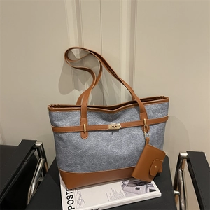 Large capacity grey felt and brown leather tote bag with stylish belt buckle accents