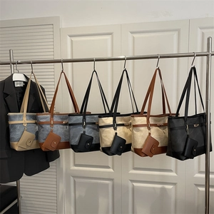 Collection of large canvas tote bags with belt buckles and matching mini coin purses
