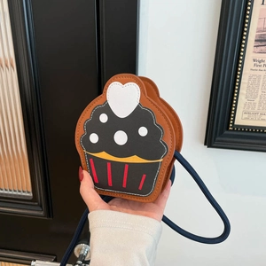 Mini cupcake shaped crossbody bag with brown and black contrast color design for girls