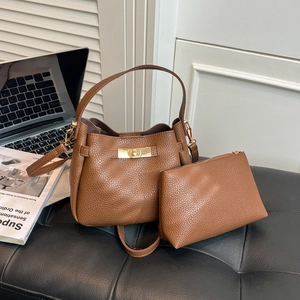 Brown lychee leather tote bag and pouch set with gold twist lock for daily use