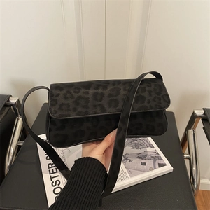 Retro leopard print faux fur shoulder bag with slender strap for a modern chic look