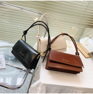 Chic women's crossbody flap bags in black, white, and brown with knotted strap details