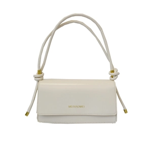 Minimalist beige crossbody square bag with golden metallic details and knotted shoulder strap