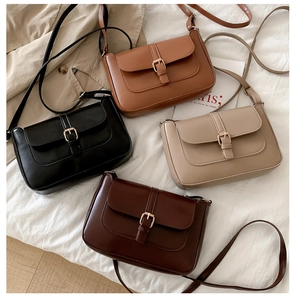 Selection of retro square crossbody bags in black, brown, and apricot with gold buckles
