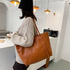 Caramel brown large woven tote bag in high-quality leather for street casual wear