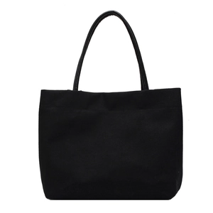 Minimalist large black canvas tote bag for women with round faux leather handles
